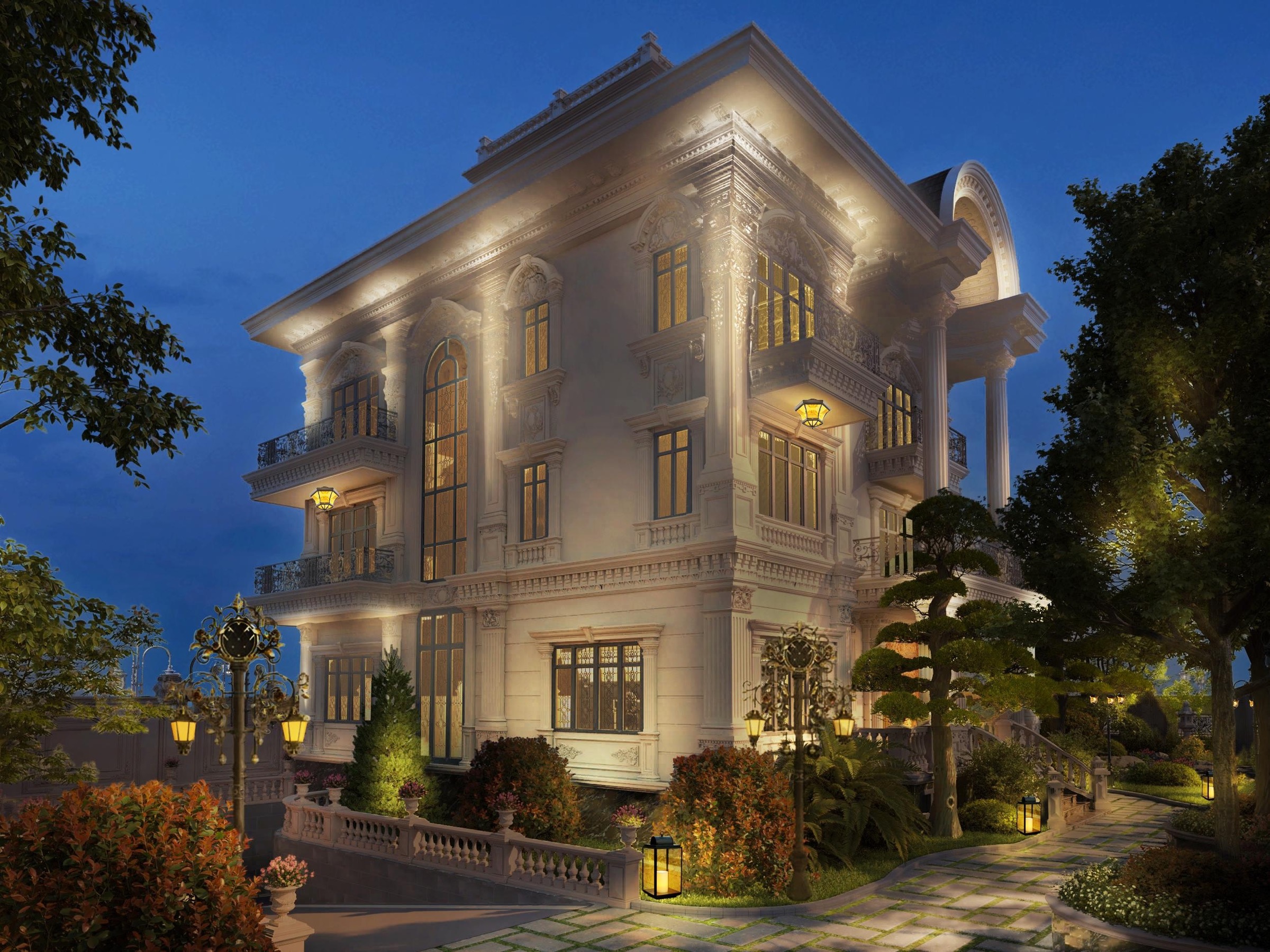 Villa Long An exterior illuminated against a deep blue evening sky