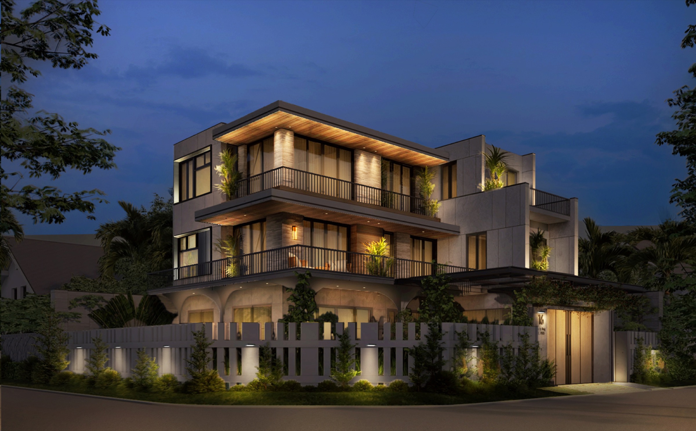 Phu My Hung villa facade lit from the garden at night